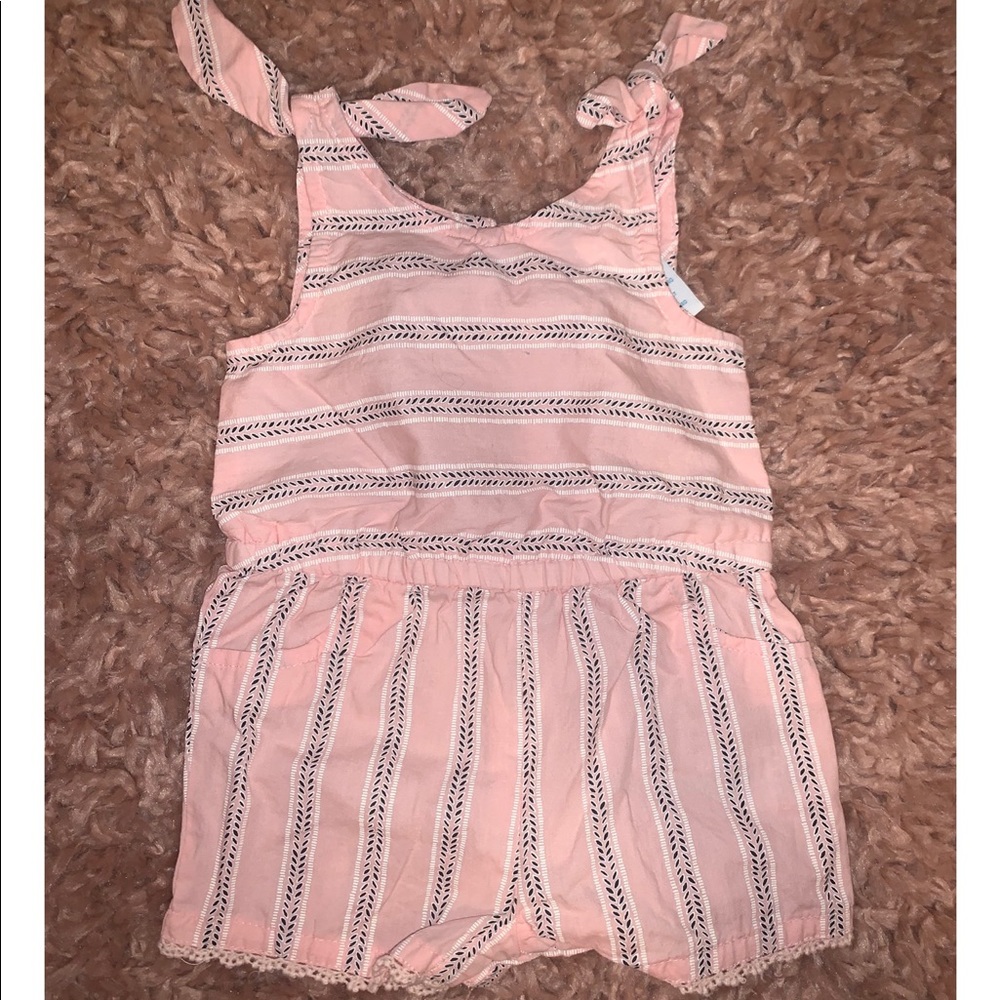 Pink baby romper.